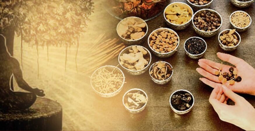 Modern Ayurveda practice with herbs, tablets, and stethoscope on wooden table