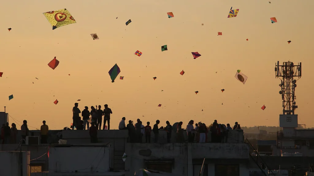 Families celebrating Makar Sankranti festival together in India
