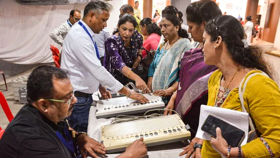 Indian voters discussing Maharashtra election issues like jobs, inflation and governance