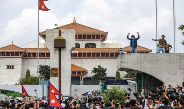 Protesters hold banners rejecting Nepal’s social media ban during Gen Z uprising