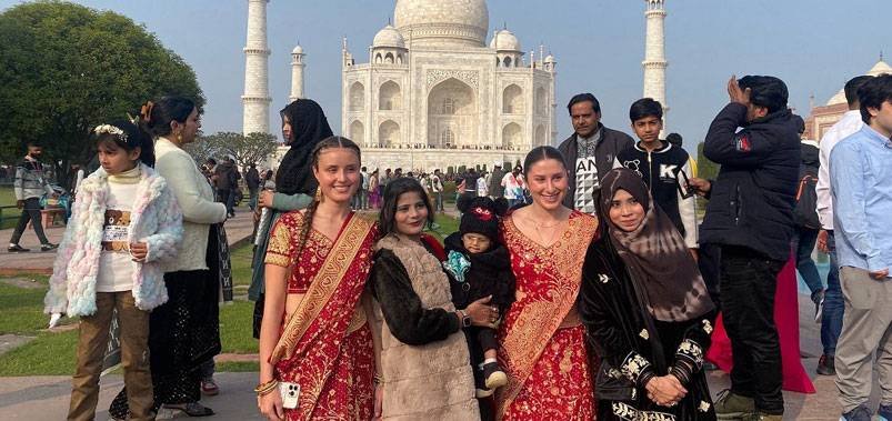 Foreign tourists visiting Taj Mahal highlighting India tourism potential