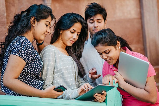 Indian young professionals working on modern technology and innovation projects.
