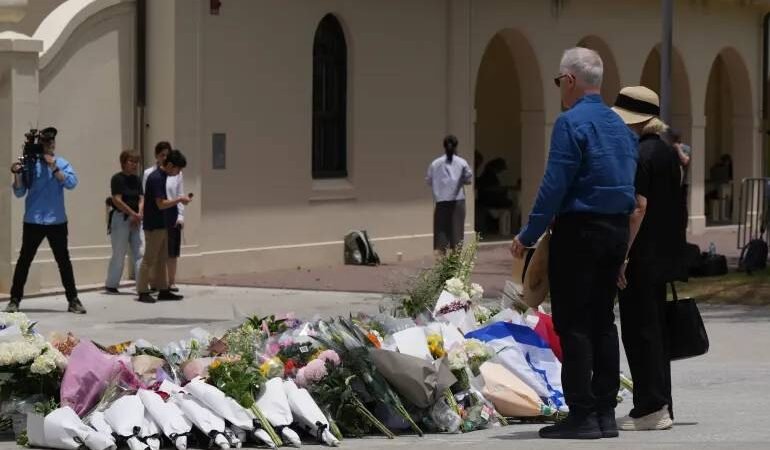 A memorial vigil honours victims of religious hate crimes globally, including targeted attacks on Jewish communities.