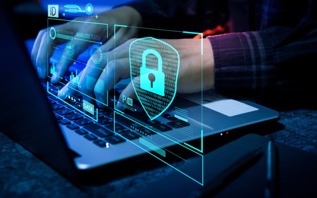 A professional enabling two-factor authentication on a laptop for data protection.